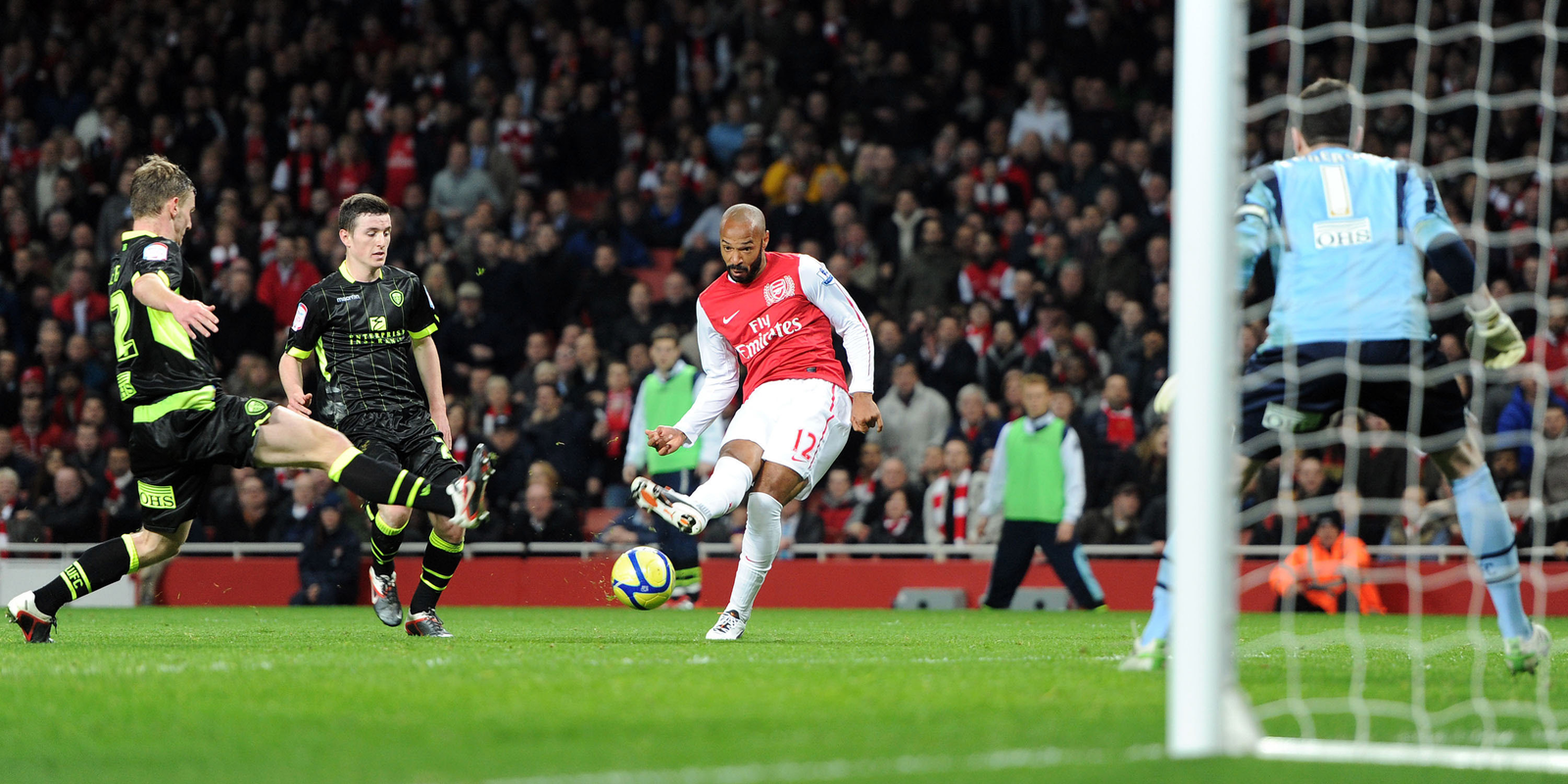 Thiery Henry taking a shot.