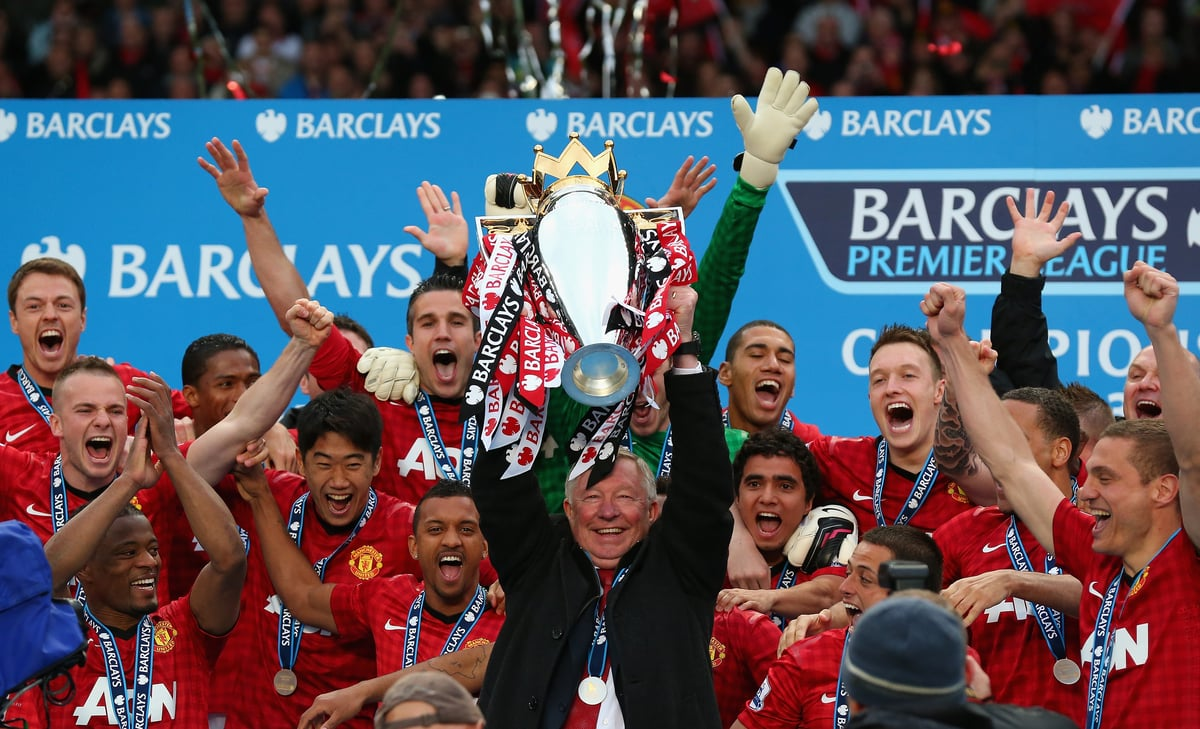 Alex Ferguson lifting the Premier League title in 2012.